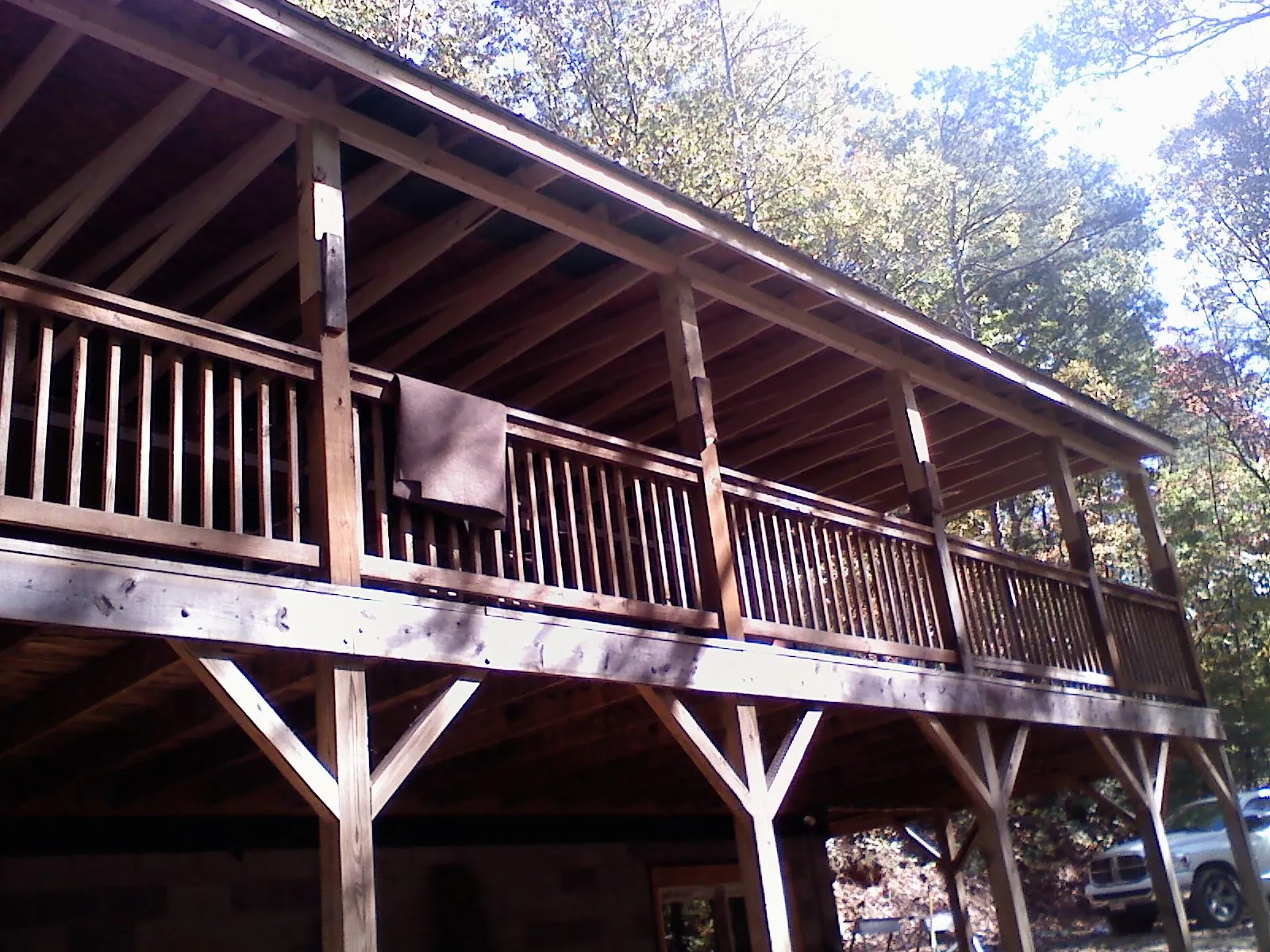 Timber framing under a new elevated porch and deck — Roof Leak Repair in Snyder by Roofing Brothers